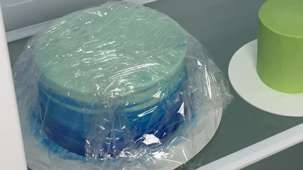 refrigerated cake wrapped in cling film saran wrap to prevent condensation 8 Ways To Improve Your Cakes in 2022 | British Girl Bakes