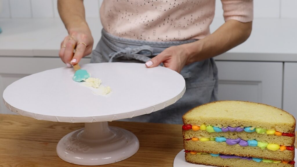 How To attach semicircle Rainbow Cake to cake board | British Girl Bakes