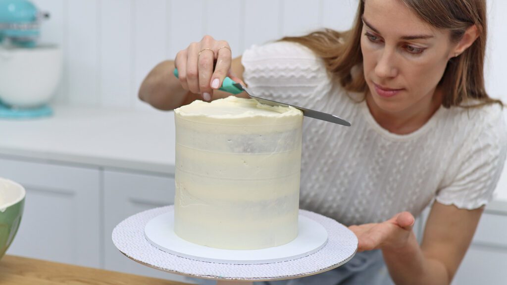 apply a crumb coat to very vanilla cake before frosting British Girl Bakes