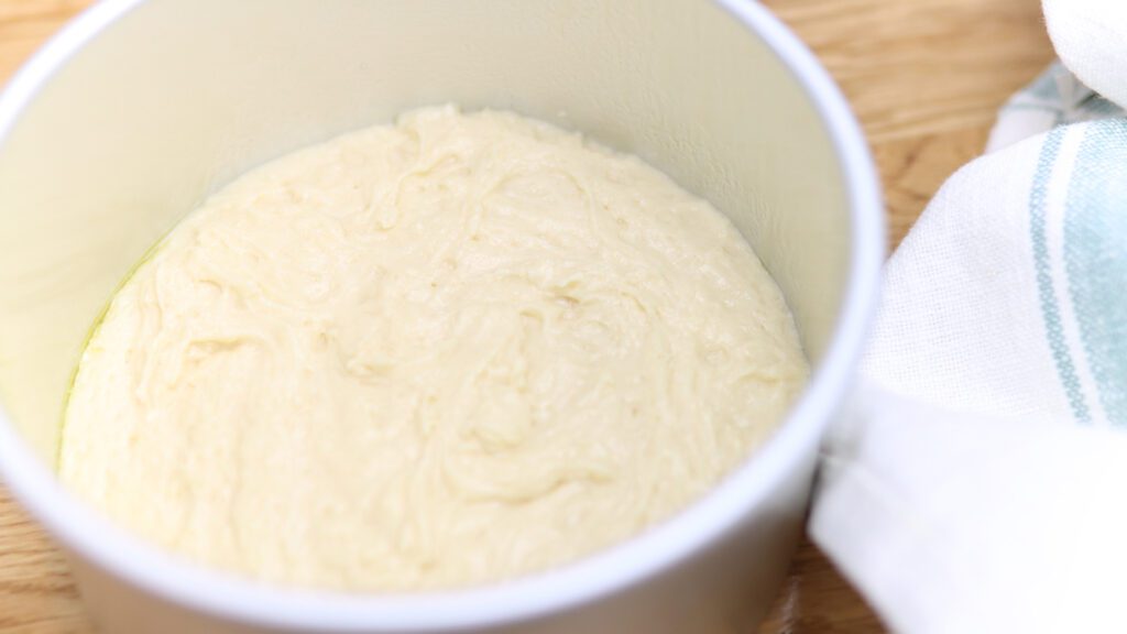 divide very vanilla cake batter between cake pans british girl bakes