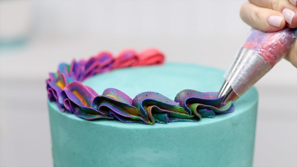 how to pipe rainbow borders swirls on cakes - 5 Minute Cake Decorating | British Girl Bakes