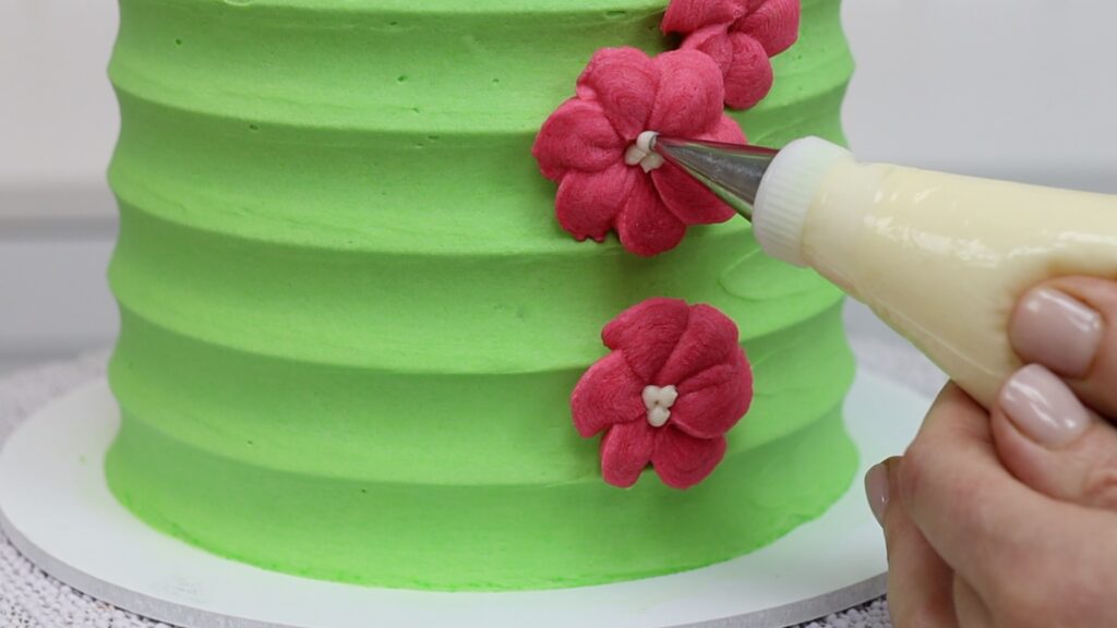 piped buttercream flower cake Parchment Paper Cake Hacks | British Girl Bakes