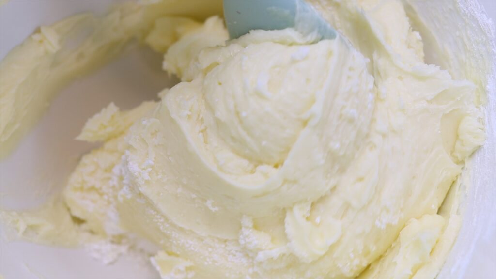 scrape down to the bottom of the mixing bowl to make 4 Minute Buttercream | British Girl Bakes