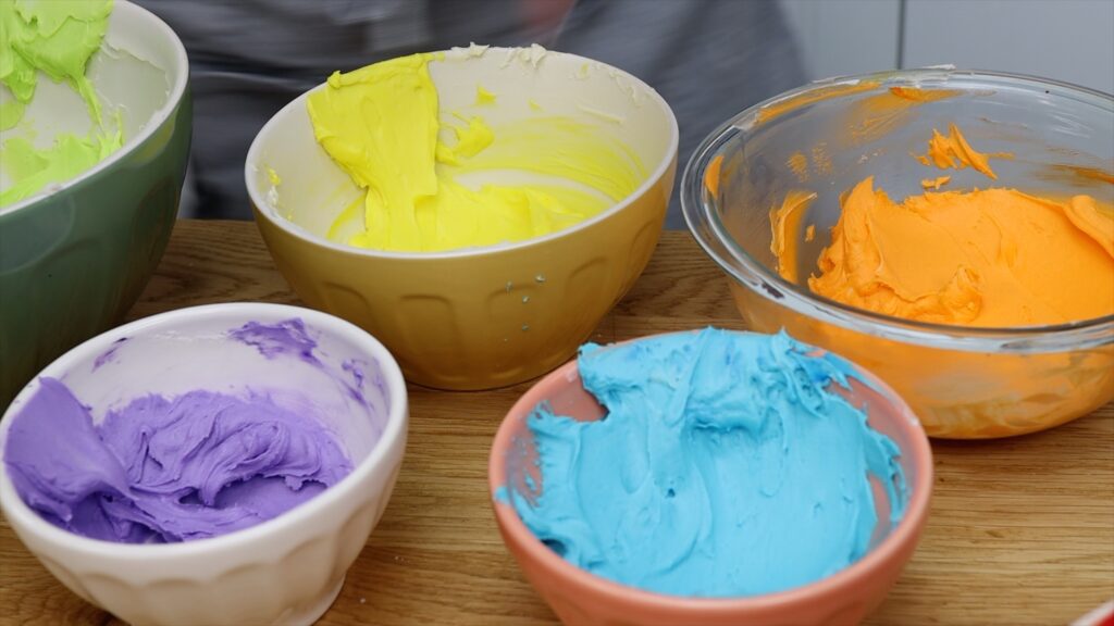 tint coloured buttercream frosting How To Make A Rainbow Cake | British Girl Bakes