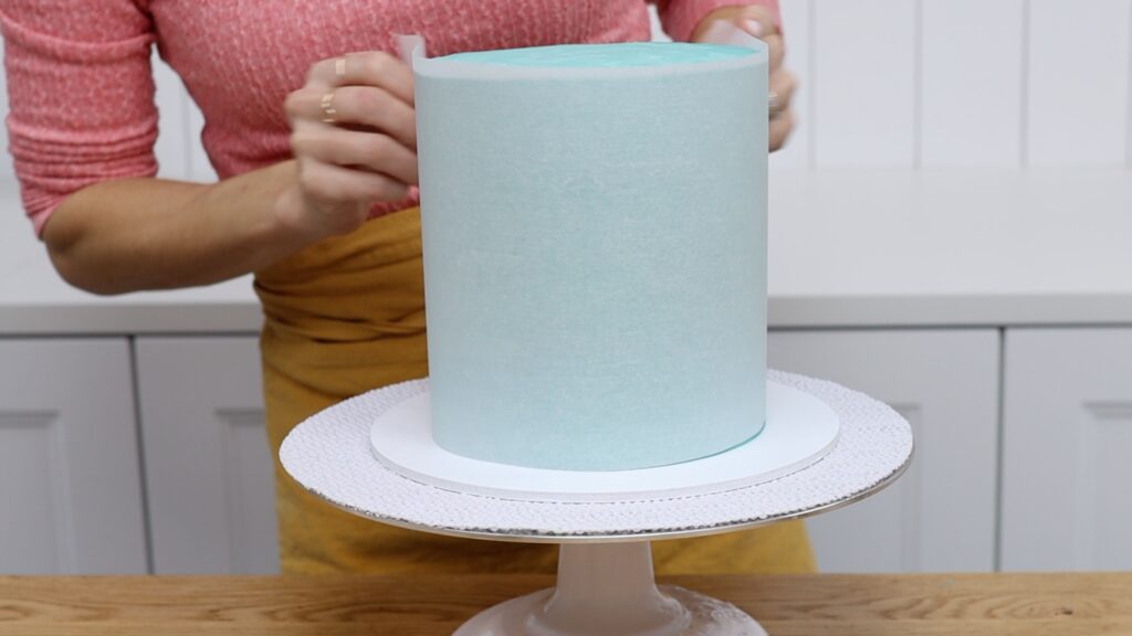 wrap parchment paper around frosted cake to measure Rainbow Homemade Stencil Cake - 5 Minute Cake Decorating | British Girl Bakes