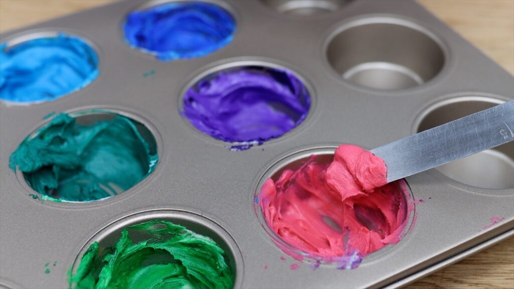 cupcake pan to mix coloured frosting 12 Secret Cake Decorating Tools You Already Have!