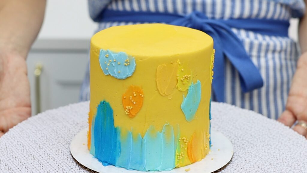 cover cake mistakes like dents with frosting texture and sprinkles