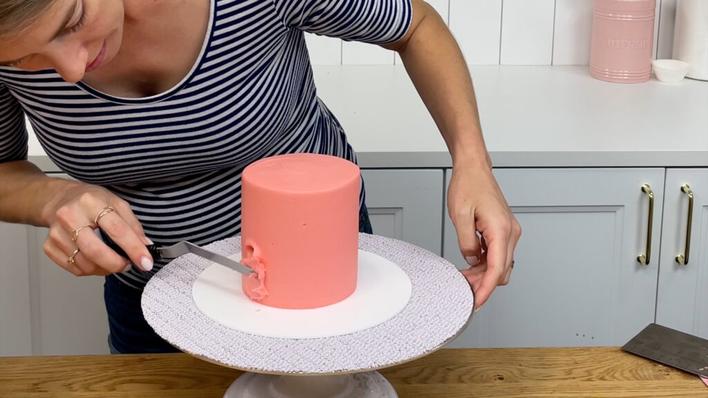 how to fix a hole in frosting on a cake