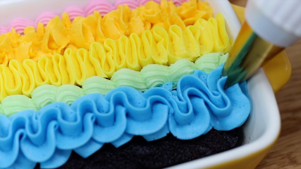 rainbow piping on tray bake cake