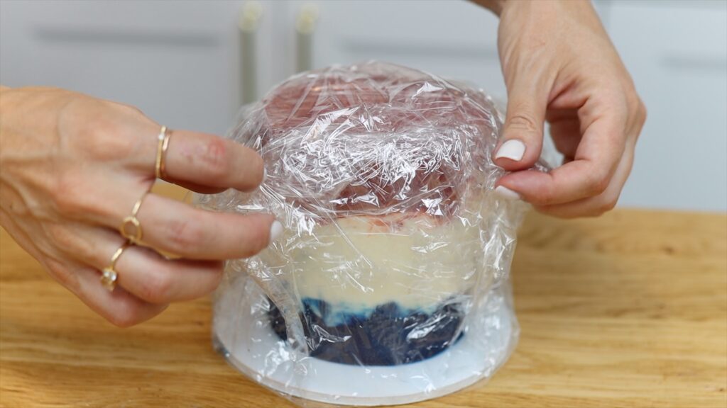 wrap cakes in plastic to prevent condensation in fridge or freezer