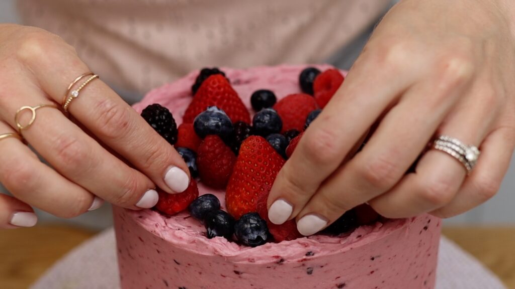 attach berries to a cake