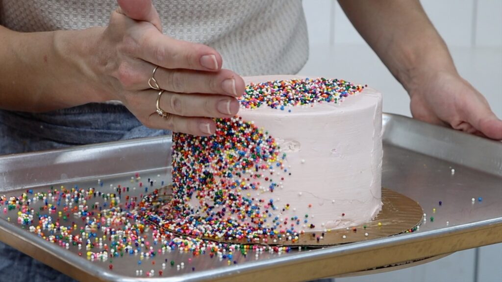 how to cover a grocery store walmart costco cake with sprinkles for Cake Makeover