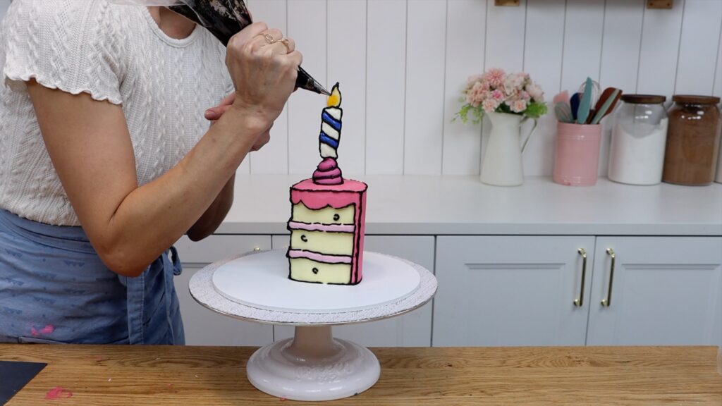 how to make the black lines on a comic cartoon cake slice