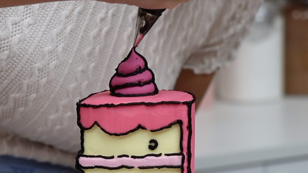 how to pipe onto a Comic cartoon Cake slice