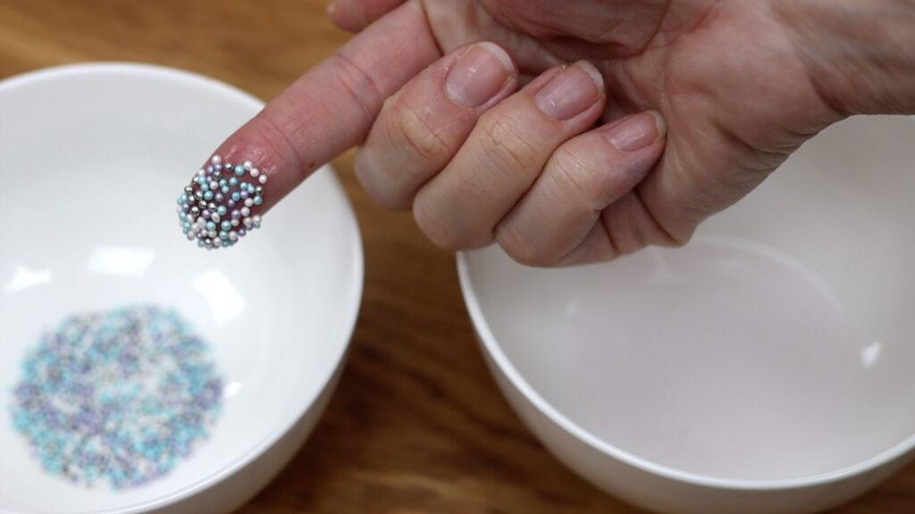 how to stick sprinkles to a cake