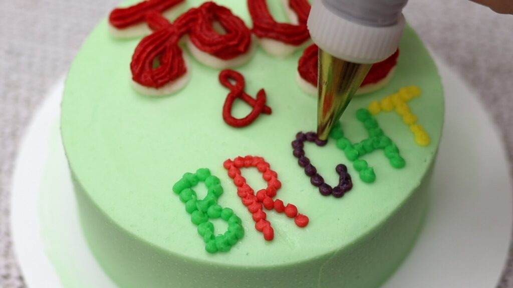 pointillism pointillist dotted writing on cakes