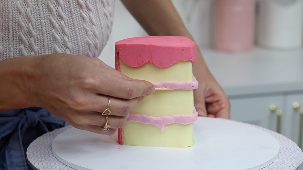 tidy up frosting with a toothpick