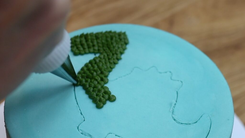 pointillism cake decorating with buttercream