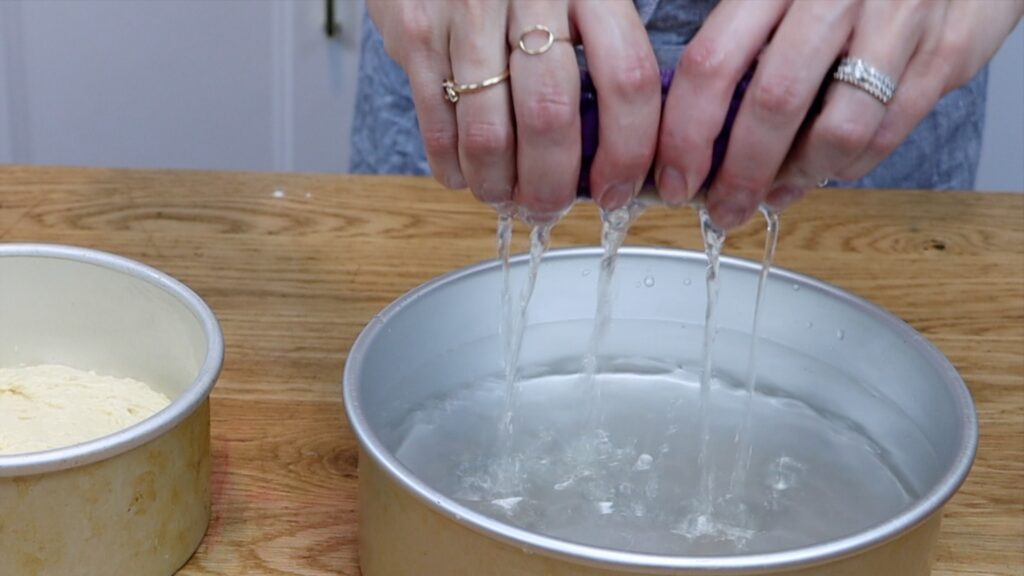 squeeze water out of bake even strips before using on cake pans