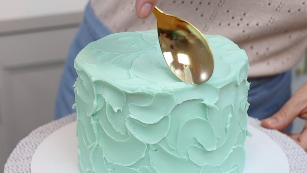 textured frosting on the top of a cake