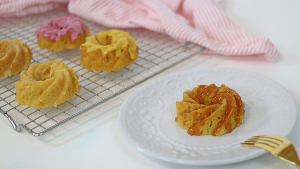 glazing and serving vanilla mini bundt cakes