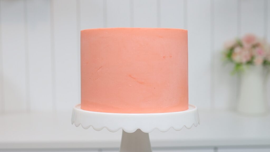 buttercream cake frosted with acrylic discs