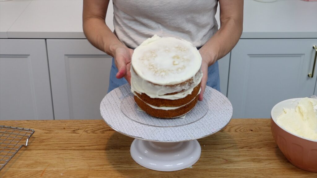 use a non slip mat between cake boards