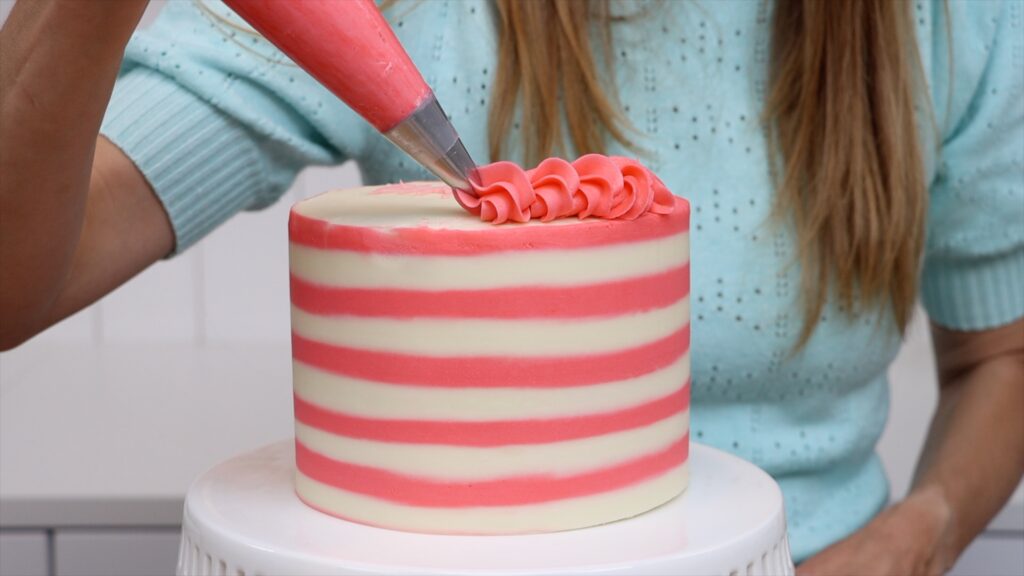 write your message before piping a border on the cake