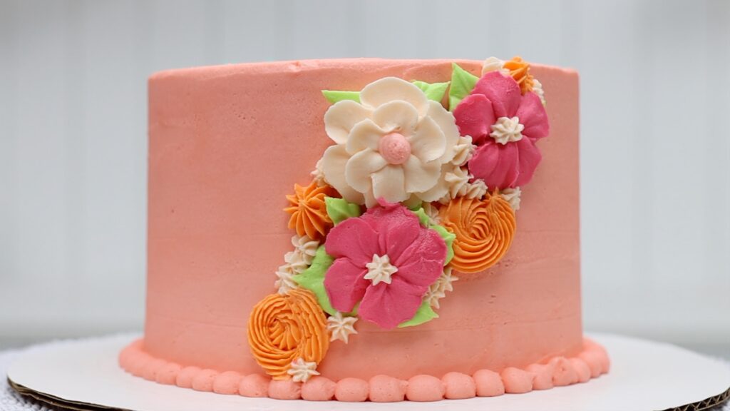 cake decorating with piped flowers