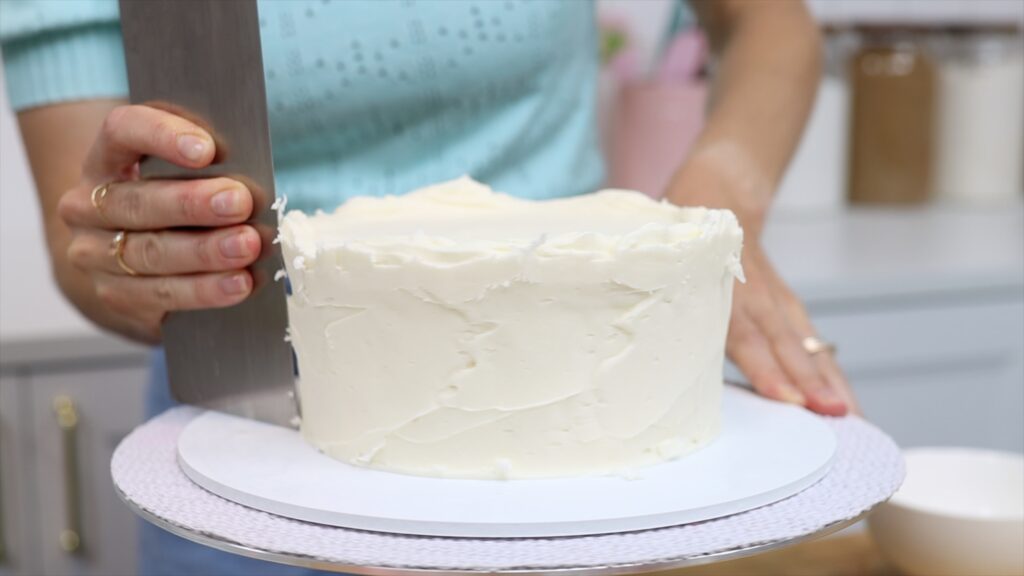 how long do you freeze a cake before scraping the frosting off