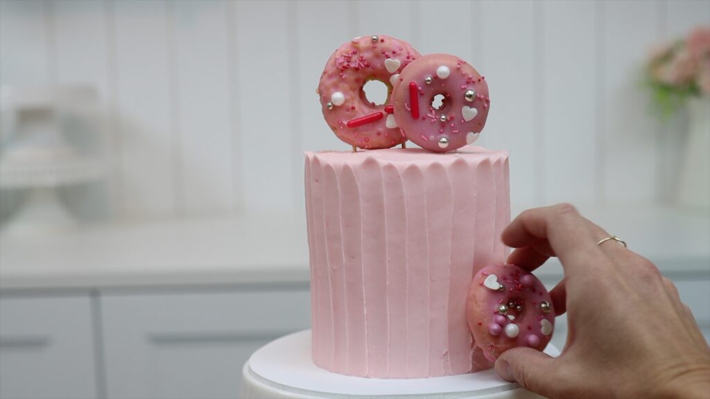 how to attach donuts to a cake