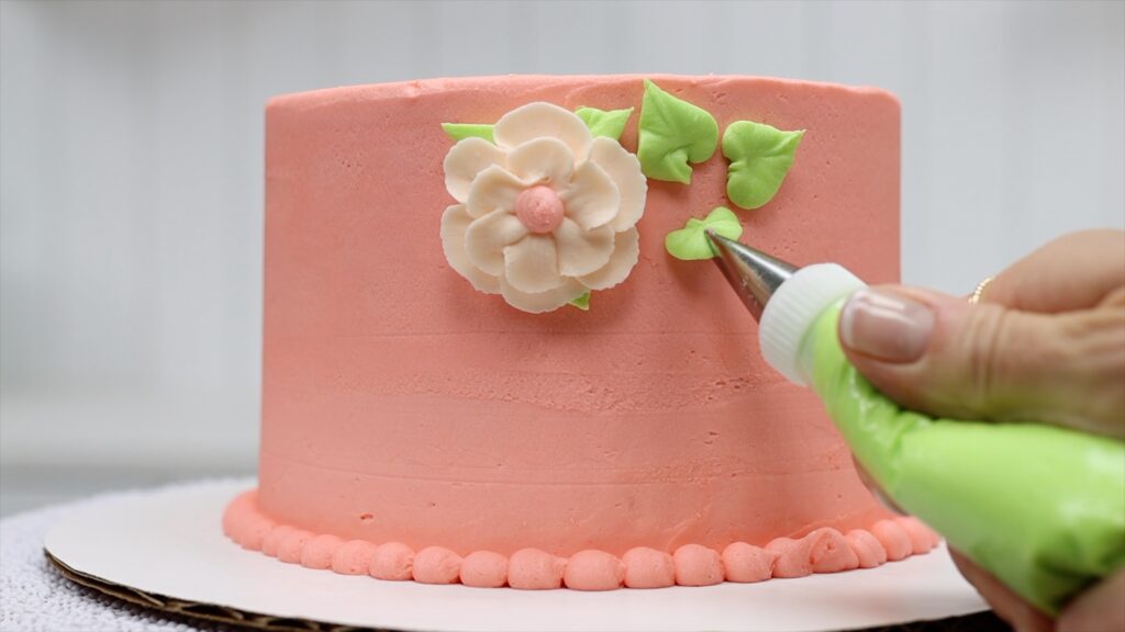 how to attach flowers to a cake