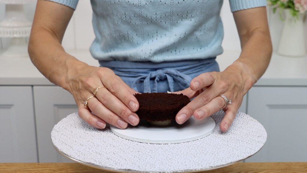 how to stick mini cakes to cake board