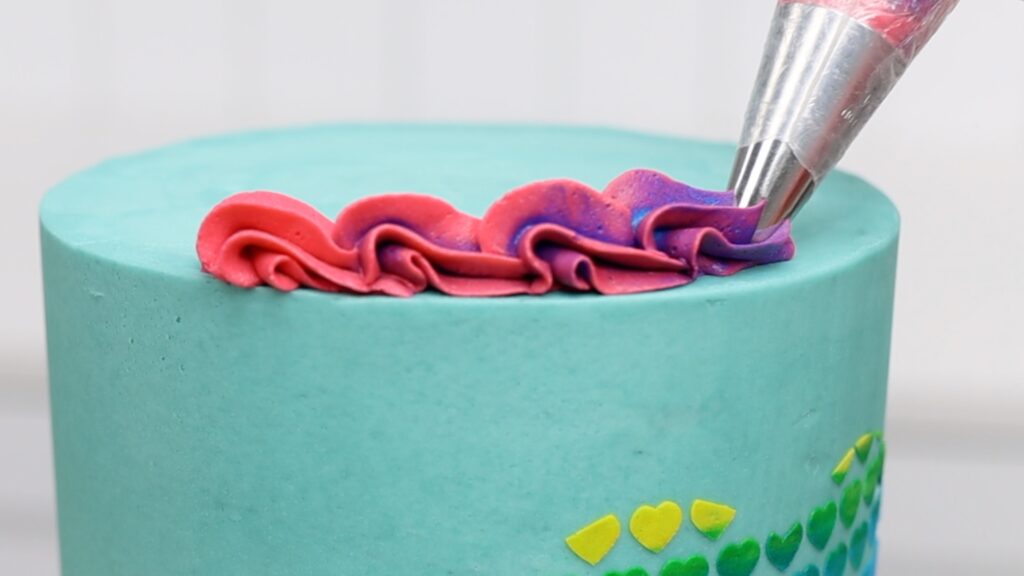 ombre rainbow piping on cake