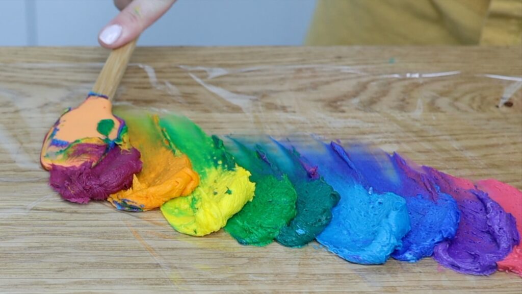 rainbow piping using plastic wrap log