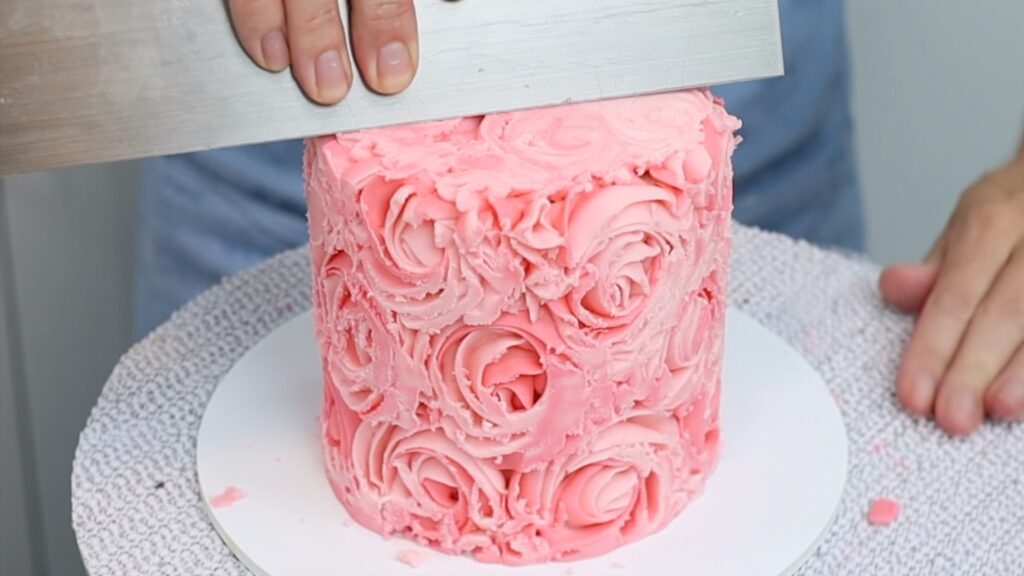 scrape frozen piping off cake