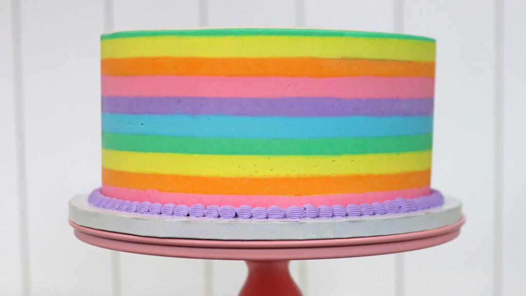 Rainbow Striped frosting on a cake