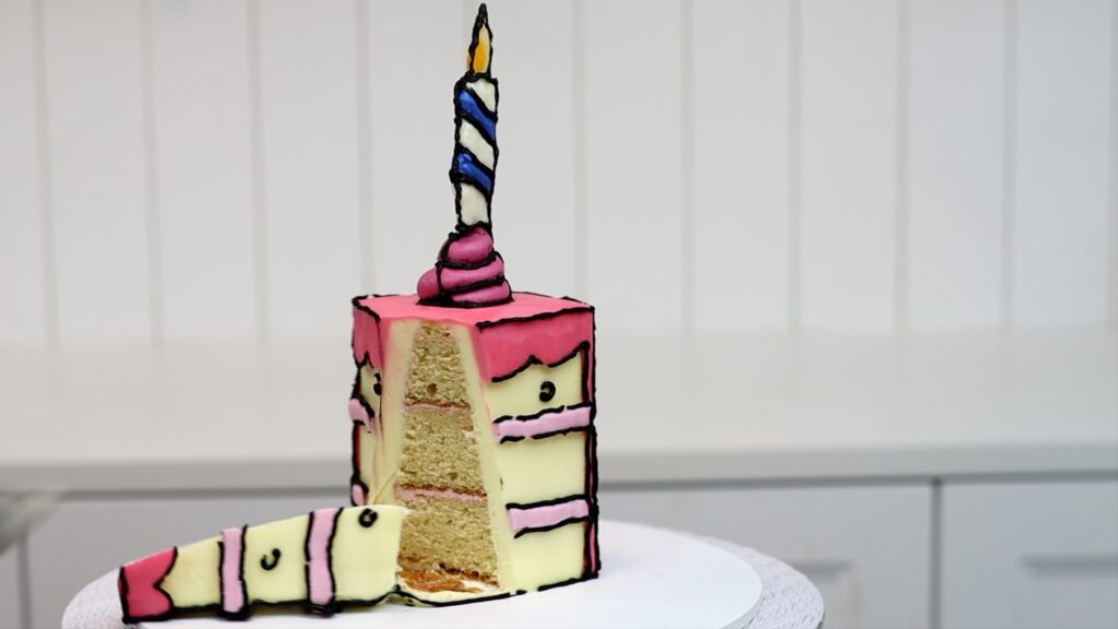 cutting into a cartool cake