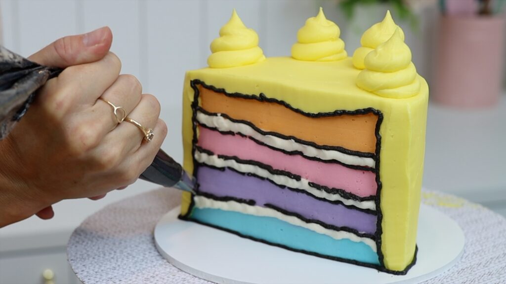how to add black lines to a cartoon cake