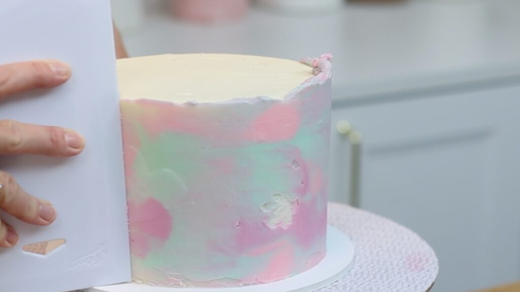 how to do watercolor frosting on a cake