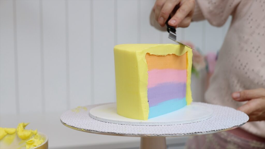 how to get smooth frosting on a half birthday cake