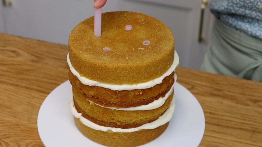 how to support a double barrell cake