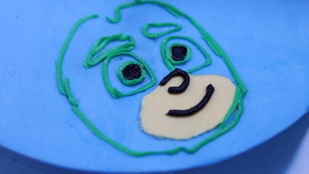 outline character with buttercream