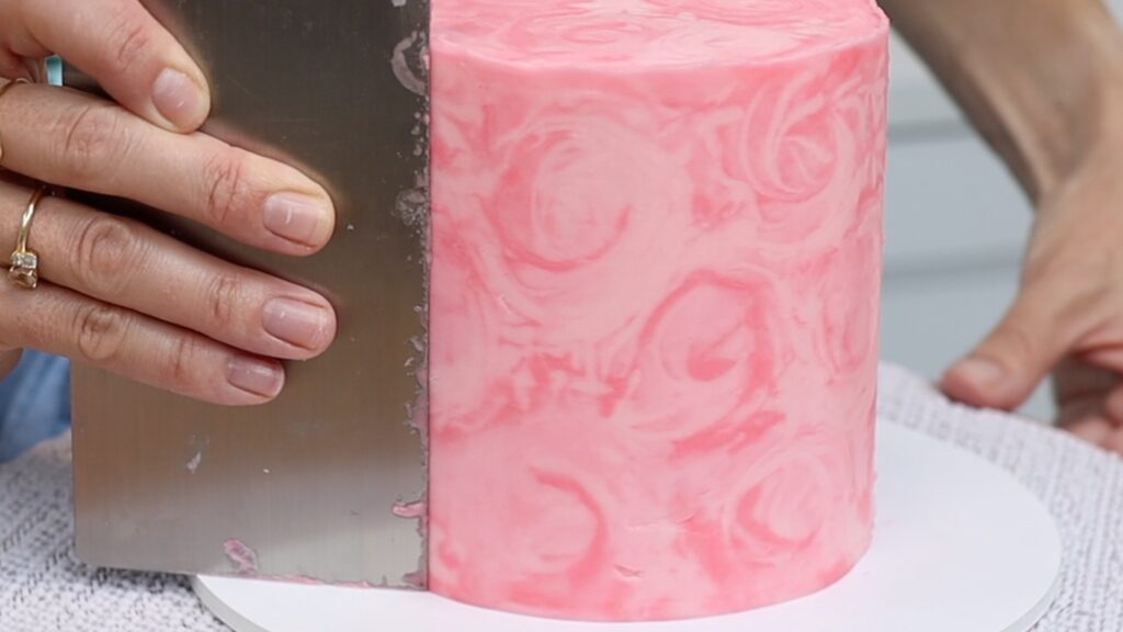 smooth frosting on a facelift frosting cake
