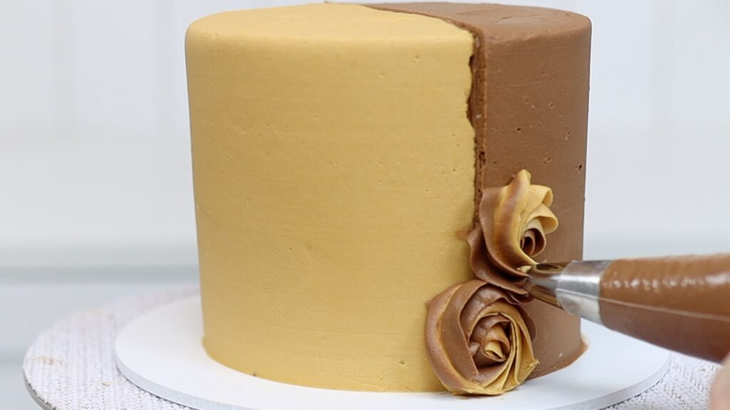 using piping to cover ugly parts of a cake