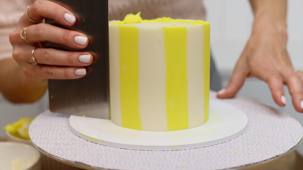 smooth frosting after acetate transfer on buttercream cake