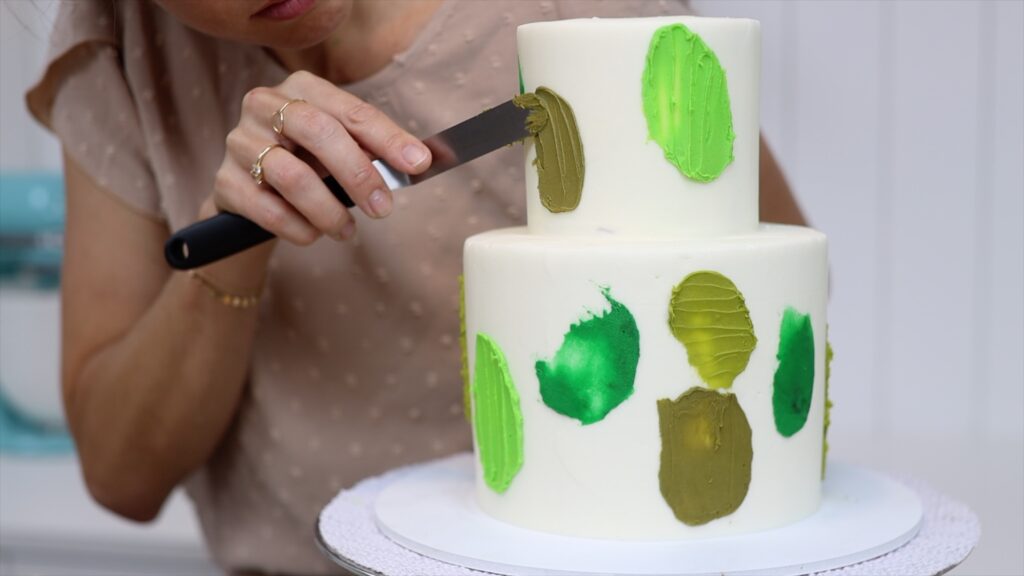 textured buttercream painting on cakes