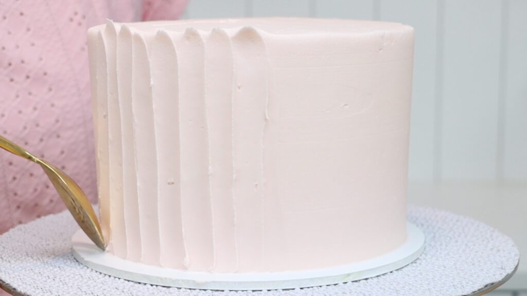 textured grooves in frosting with a spoon