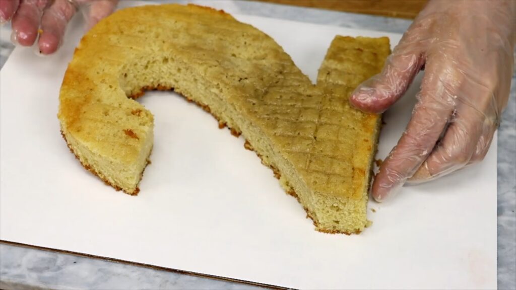 how to attach a number cake to a cake board