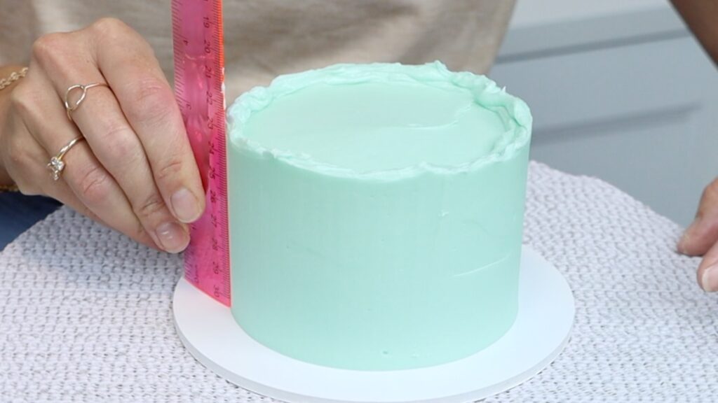 smooth frosting with a ruler